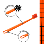 Orange Boie toothbrush with callout circles highlighting recycled-material handle and hanging hole on white background.