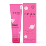 Bright pink Boka Kids Bubble Gum toothpaste tube and matching boxed packaging with candy illustrations on white background.