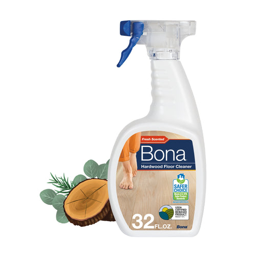 Spray bottle of Bona hardwood floor cleaner with cedar wood label and wood slice illustration on white background