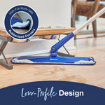 Low-profile Bona mop head cleaning under a raised feeding station, showing rubberized corner detail