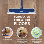 Bona mop head with a disposable white cleaning pad on a hardwood floor and text proclaiming formulated for wood floors.