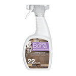 Front view of a Bona Pet System multi-surface floor cleaner spray bottle with label, dog and cat image.