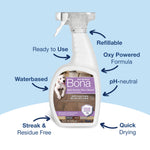 Bona Pet System spray bottle on blue background with arrows highlighting features like refillable and pH-neutral.