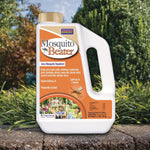 Bonide Mosquito Beater jug placed outdoors on a stone edge showing orange product label and handle