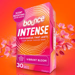 Bright pink-orange box of Bounce Intense Vibrant Bloom dryer sheets with floral accents