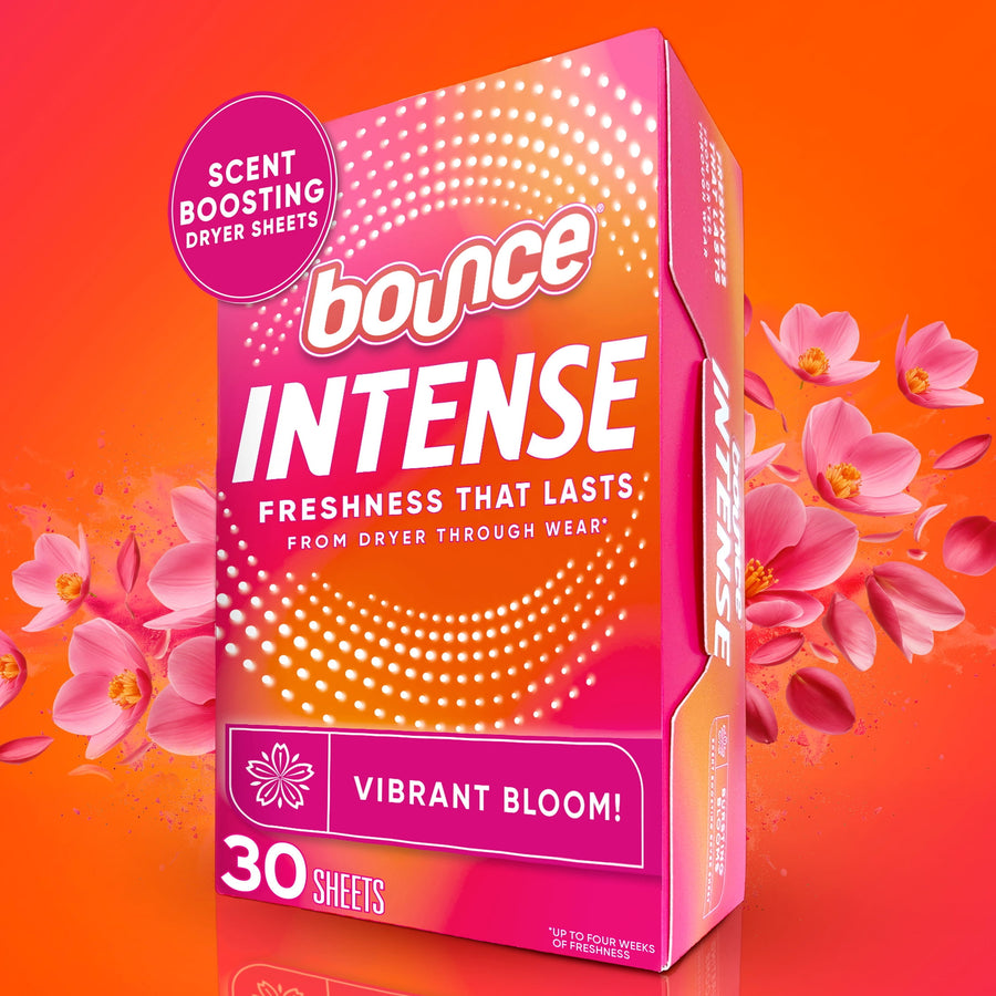 Bright pink-orange box of Bounce Intense Vibrant Bloom dryer sheets with floral accents