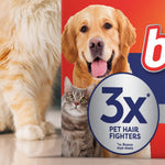 Close-up of packaging art showing a golden retriever, a cat and a circular '3x pet hair fighters' badge