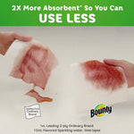 Two Bounty sheets absorbing a red liquid, text claims higher absorbency with logo