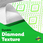 Close-up of a textured white Bounty paper towel corner folded back over a green background with 'Durable Diamond Texture' text.