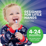 Smiling toddler holding a Brilliant round-head toothbrush with product copy reading ‘Designed for little hands’ and age range.