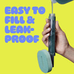 Hand pouring liquid into the clear reservoir of a Brite fillable dishwand with 'EASY TO FILL & LEAK-PROOF' text on yellow background
