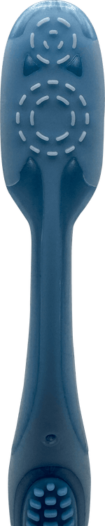 Close-up of toothbrush back showing molded circular tongue-cleaner texture and handle rear profile