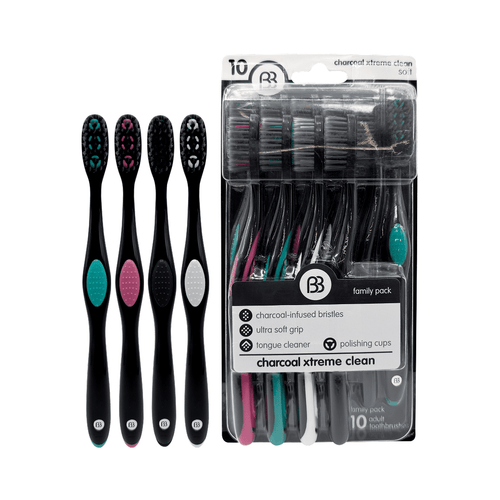 Packaged Brush Buddies family pack of black charcoal toothbrushes with colored grip accents and visible blister pack.