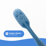 Close-up of a toothbrush tongue cleaner surface with a blue label calling out ‘tongue cleaner’ for fresh breath
