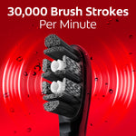 Toothbrush head close-up against red background with '30,000 Brush Strokes Per Minute' text and vibration graphics