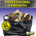 Open black contractor bag filled with construction debris and a 2.0 mil strength badge and Brute Super Tuff logo