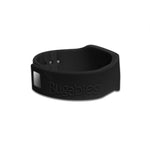 Black Bugables silicone wristband with embossed logo and white rectangular logo plate on white background
