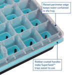 Detail shot of Burpee SuperSeed tray corner showing raised perimeter, clear lid and blue silicone cells with callout labels