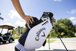 Golf-bag scene with a person reaching into a Callaway bag and a Star brite mesh trash bag shown in the background