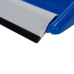 Tight macro of dust pan rubber lip and blue plastic edge on a Camco dust pan