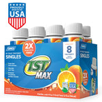 Pack of Camco TST Max RV toilet treatment singles in citrus scent, eight small bottles visible in blue-orange packaging with USA badge.