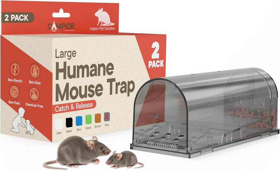 Transparent gray plastic humane mouse trap shown beside branded packaging and two mice on a white background
