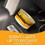 California Scents Hollywood Glow spillproof can placed in a car console with orange banner text promoting scent lasting up to 60 days.