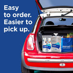 Open car trunk with groceries and visible Dixie paper cups and paper towels for pickup promo