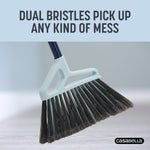 Close-up of Casabella broom head showing dual bristles and light blue handle accent with promotional headline