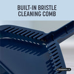 Close-up of navy dustpan rim with built-in bristle cleaning comb visible and headline about the feature