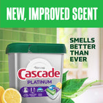 Cascade Platinum silver tub with lemon and green leaves on a kitchen background and text announcing new improved scent