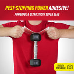 Person in red shirt pulling a Catchmaster glue board to demonstrate adhesive strength, holding the board above a dumbbell.