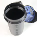 Top-down view into Chapin hand spreader showing wide mouth and blue dosing lid