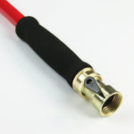 Foam-padded handle section of a red watering wand with a brass threaded hose connector and shutoff lever