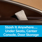 Gray woven charcoal pouch tucked into a car door storage pocket with stash-it-anywhere text banner