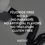 Swirl of black charcoal toothpaste on a gray background with bold white text listing product attributes like “Fluoride Free” and “Gluten Free” and brand name Native.