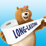 Female Charmin bear holding an oversized toilet paper roll with a sheet printed 'LONG-LASTING'
