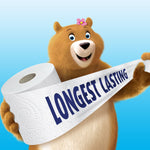 Animated Charmin bear smiling and holding a long strip of toilet paper printed with the words “Longest Lasting.”