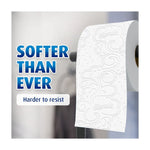 Close-up of embossed Charmin toilet paper on a holder with headline 'Softer Than Ever' and small caption