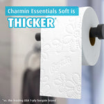 Close-up of Charmin embossed toilet paper roll on a holder with 'Thicker' headline