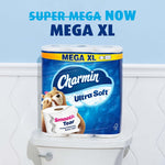 Pack of Charmin Ultra Soft Mega XL toilet paper sitting on a bathroom toilet tank with 'Mega XL' headline