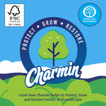 Circular Charmin environmental logo with tree graphic and messaging about protecting, growing and restoring forests