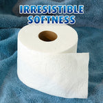 Single Charmin toilet paper roll on a soft blue fabric with embossed pattern and headline 'IRRESISTIBLE SOFTNESS'