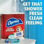 Charmin Ultra Strong toilet paper roll staged with a Charmin flushable wipes packet in foreground and slogan text