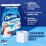 Charmin Ultra Soft package with a single toilet paper roll in foreground and text bullets promoting cushiony softness, strength, and absorbency.