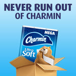 Charmin Ultra Soft package emerging from an open cardboard box under headline 'Never Run Out of Charmin'