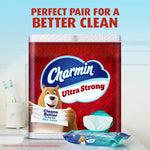 Charmin Ultra Strong package staged in a bathroom scene with bear mascot and a pack of Charmin wipes nearby