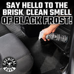 Hand spraying Chemical Guys Black Frost into a car interior with bold headline text promoting the scent