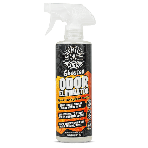 Spray bottle of Chemical Guys Ghosted Odor Eliminator with orange and black label on white background