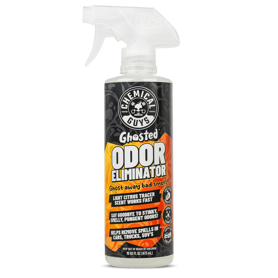 Spray bottle of Chemical Guys Ghosted Odor Eliminator with orange and black label on white background